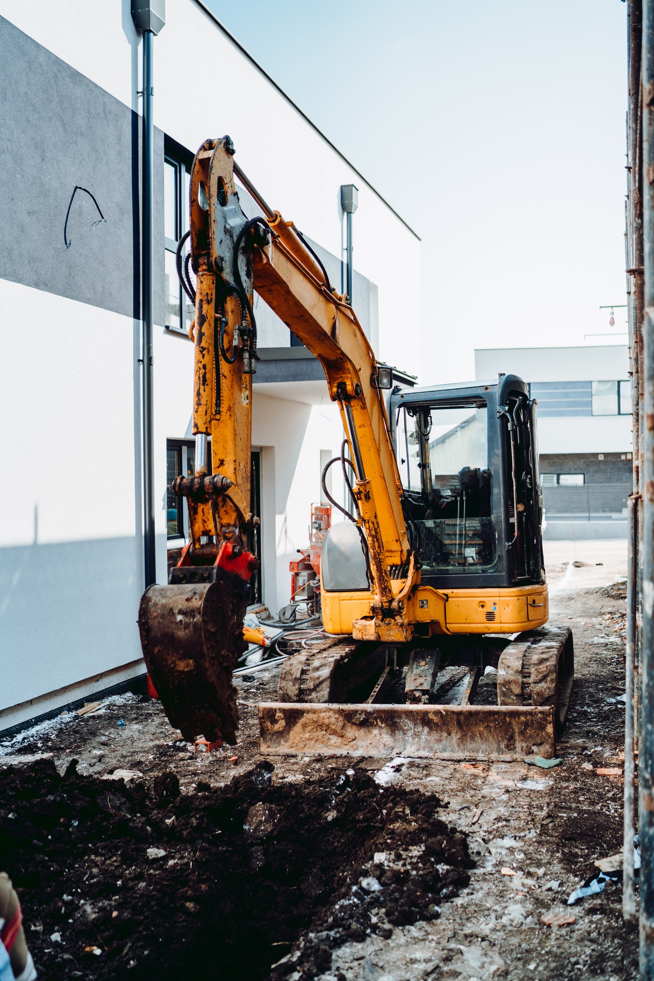 mini excavator digging on construction site